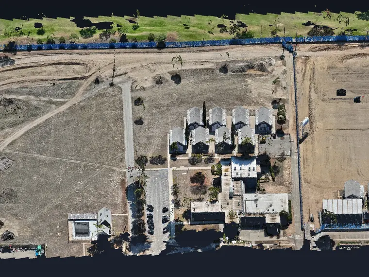 Point cloud of the Costa Mesa site in true color: buildings, the site fence, haul roads and the golf course next door.